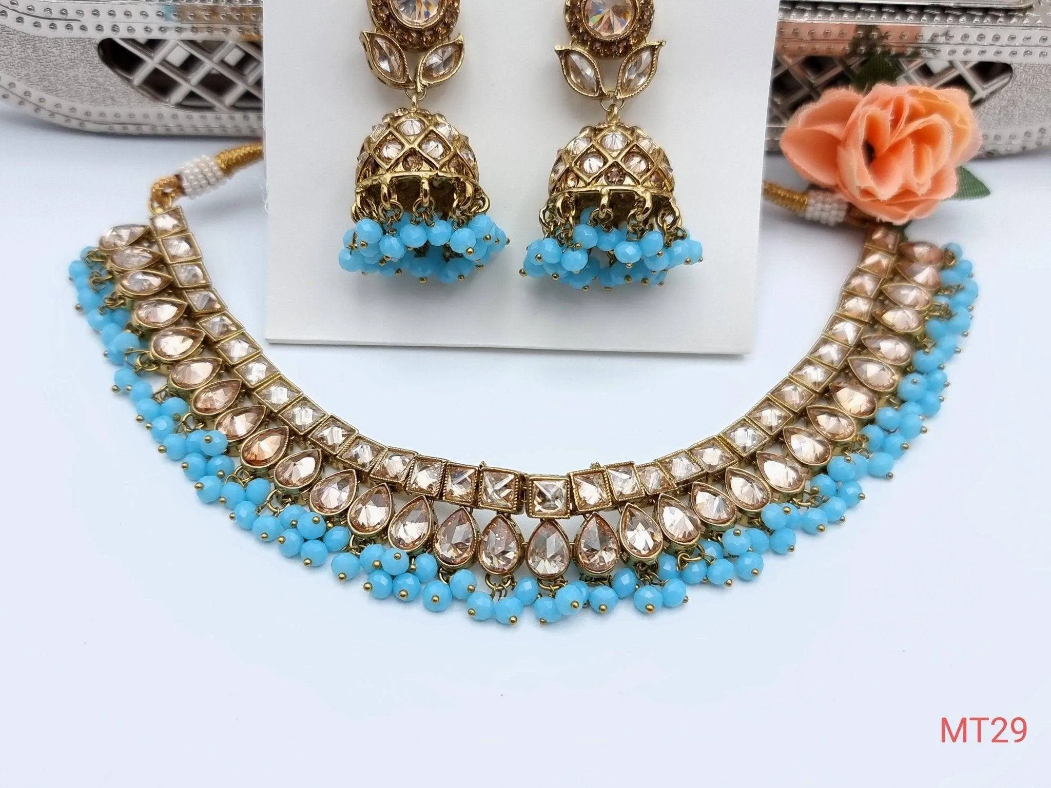 Blue Polki Choker Set with Jhumki Earrings and Tikka