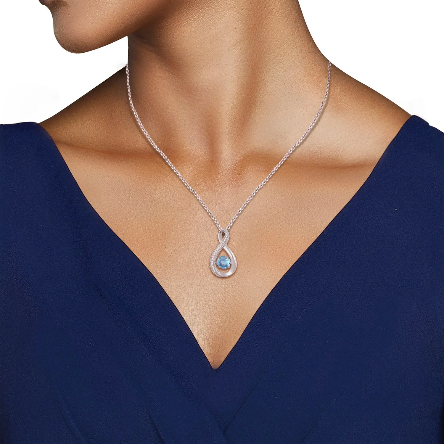 Jewelili Sterling Silver With Swiss Blue Topaz and Round Created White Sapphire Pendant Necklace